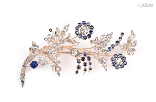 A sapphire and diamond spray brooch, the foliate spray brooc...