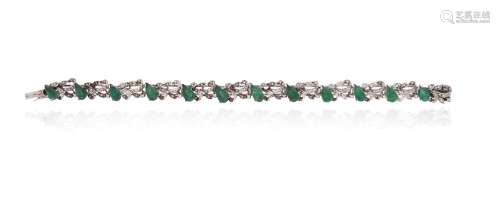 An emerald and diamond-set white gold bracelet, set with pea...