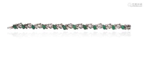 An emerald and diamond-set white gold bracelet, set with pea...