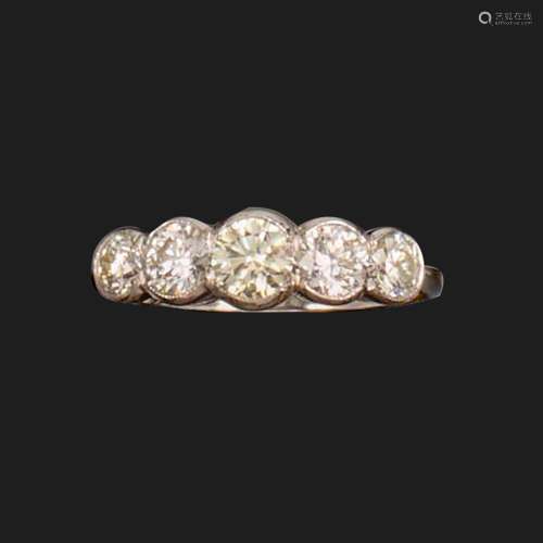 A diamond five-stone ring, rubover-set with five graduated r...