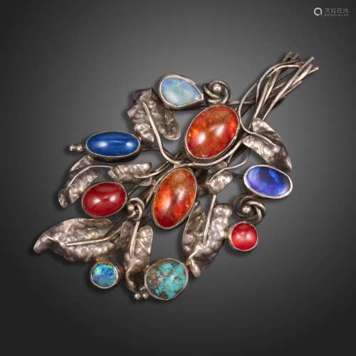 A gem-set silver folaite brooch attributed to Mary Thew, set...
