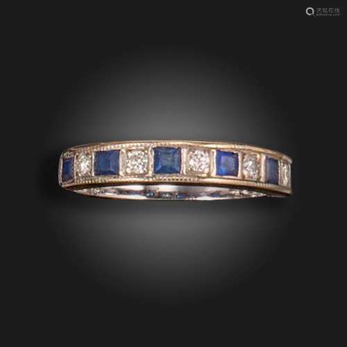 A sapphire and diamond half-hoop ring, alternately-set with ...