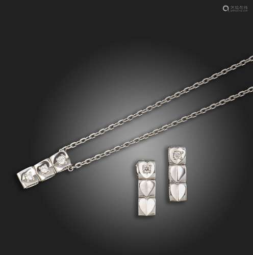 A diamond-set white gold necklace and matching earrings by E...