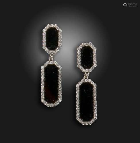 A pair of onyx and diamond earrings, the onyx plaques are se...