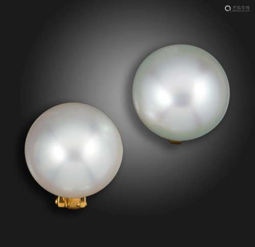 A pair of cultured pearl earrings by Spink, the button-shape...