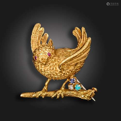 An 18ct gold bird brooch, rubies eyes and a trefoil of a dia...