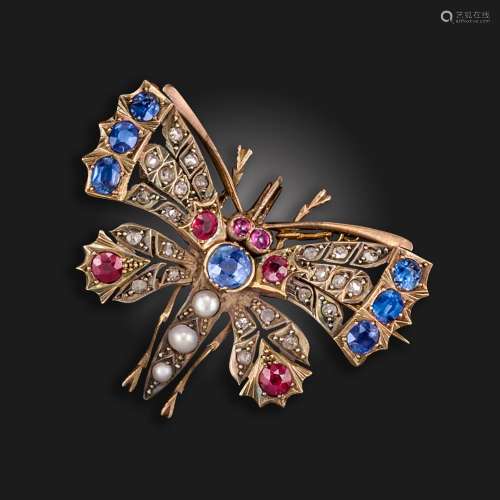 A gem-set butterfly brooch, set with sapphires, diamonds, ru...