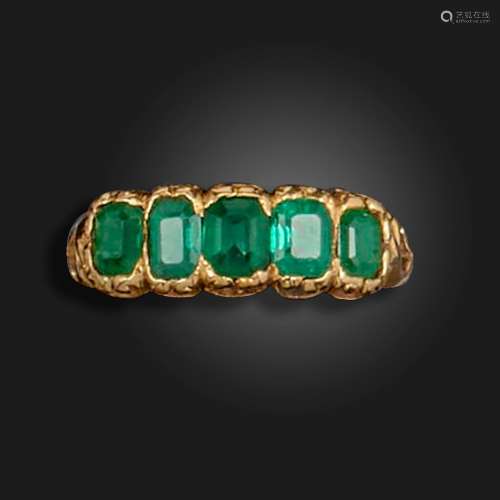 A late Victorian emerald five stone ring, set with graduated...