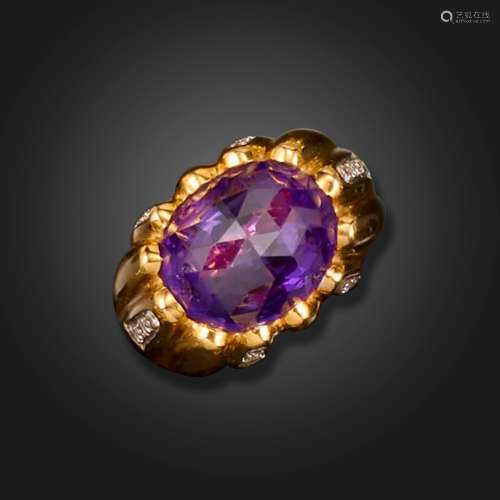 An amethyst and diamond ring by Sabbadini, the fluted gold r...