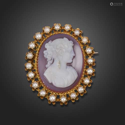 A 19th century hardstone cameo-mounted gold brooch, the came...