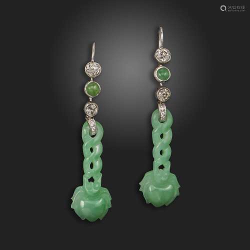 A pair of jade and diamond earrings, the carved jadeite drop...