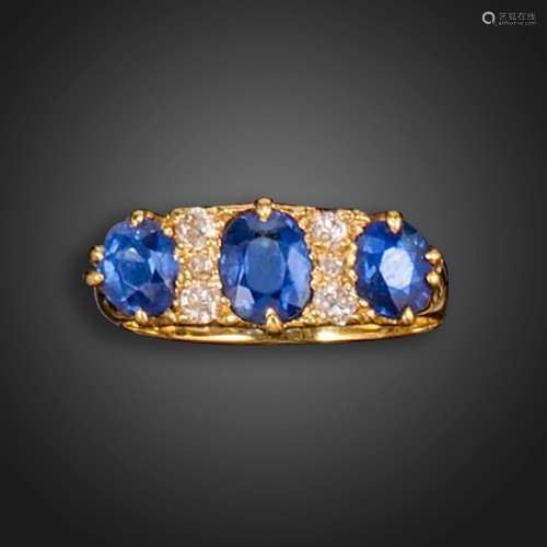 A late Victorian sapphire and diamond half-hoop ring, set wi...