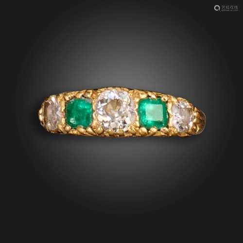 An emerald and diamond gold half-hoop ring, set with three o...