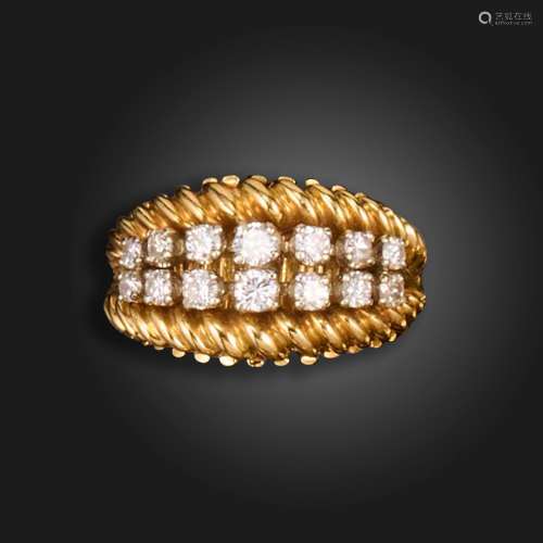 A diamond two row gold ring, the graduated round brilliant-c...