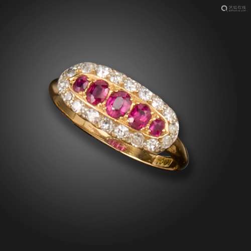 An Edwardian ruby and diamond cluster ring, set with graduat...