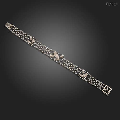 An Edwardian seed pearl platinum bracelet, the square links ...