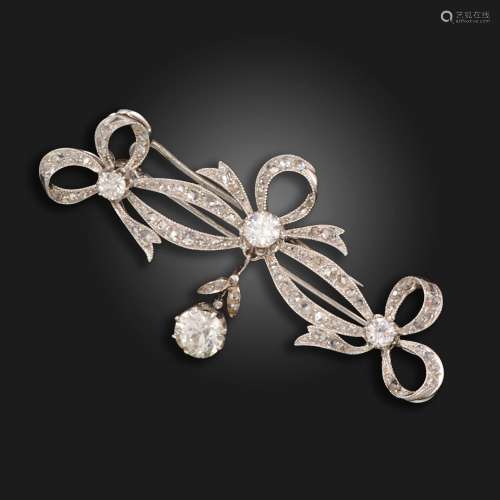 An early 20th century diamond bow brooch, the trio of bows s...