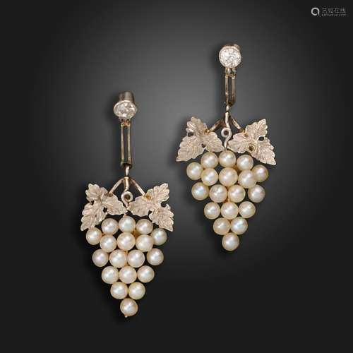 A pair of Edwardian fruiting vine earrings, each set with an...