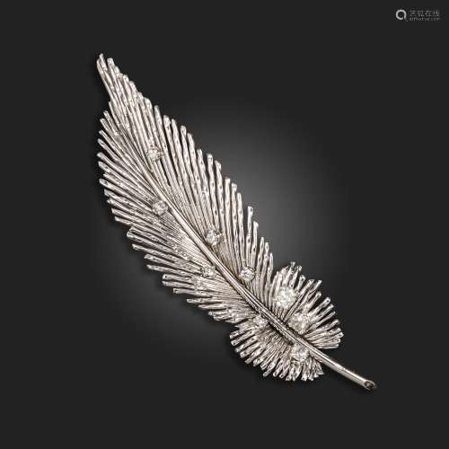A diamond white gold leaf brooch by Sterle, of open bar desi...
