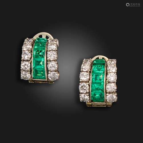 A pair of emerald and diamond hoop earrings, set with gradua...