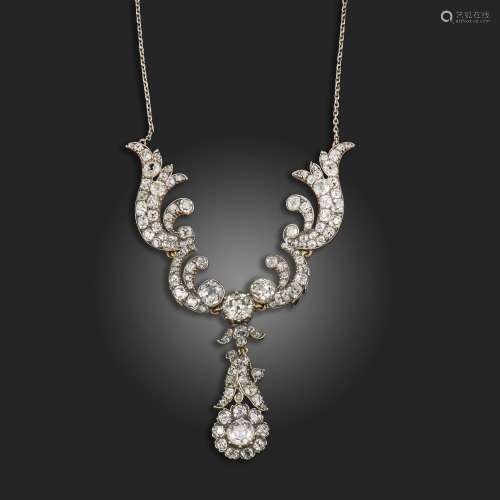 A late 19th century diamond necklace, the foliate scroll upp...