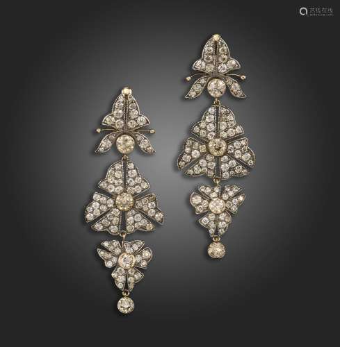 A pair of Russian diamond drop earrings, of stylised foliate...