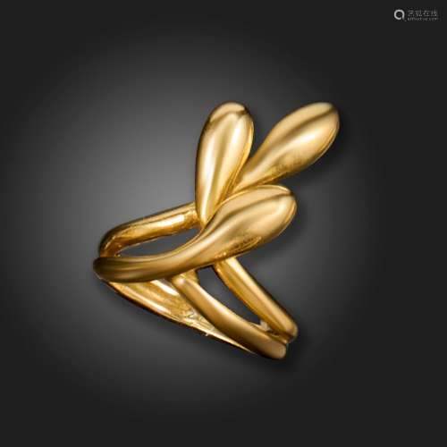 A gold abstract ring by Lalaounis, of abstract foliate form ...