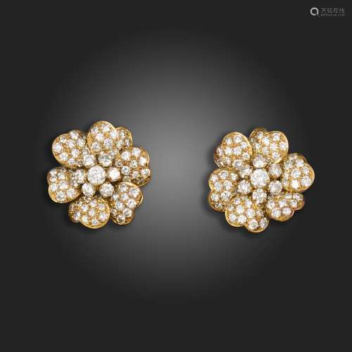 A pair of 18ct gold and diamond earrings, each designed as a...