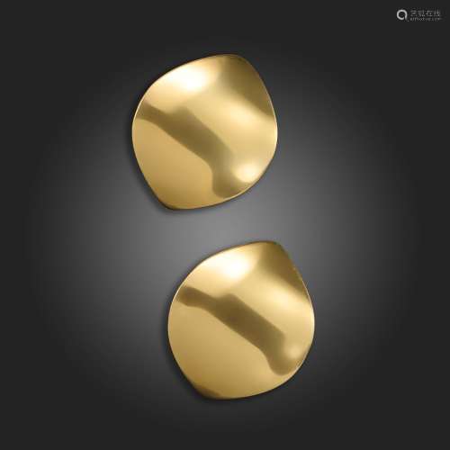 A pair of gold earrings by Georg Jensen, design by Nanna Dit...