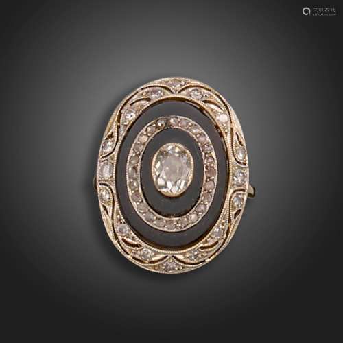 An onyx and diamond oval plaque ring, formed from an Art Dec...