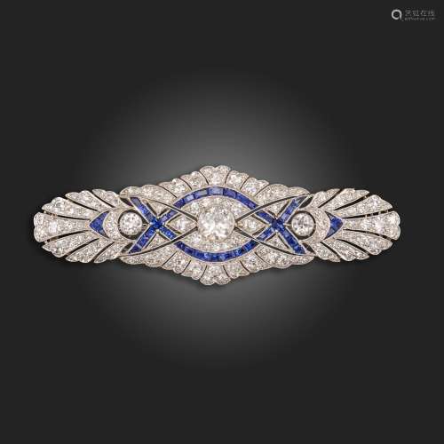 A sapphire and diamond brooch, centred with an old circular-...