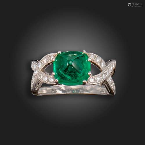 An emerald and diamond ring, the sugarloaf cabochon emerald ...