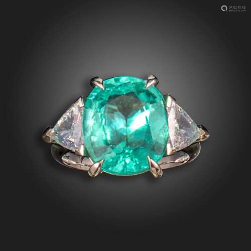 A Paraiba-type tourmaline and diamond three-stone ring, the ...