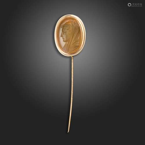 A early 19th century carnelian intaglio-mounted gold stick p...