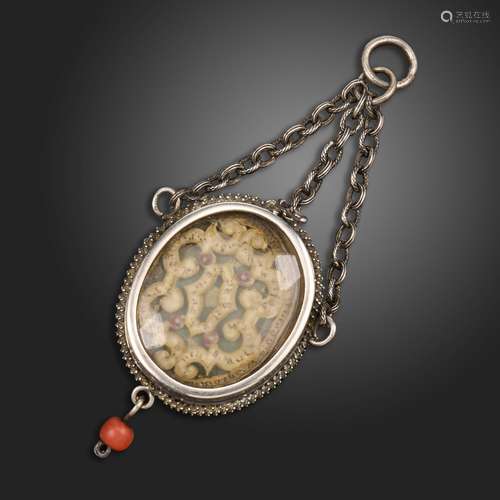 A mid 17th century silver locket pendant, possibly French, g...