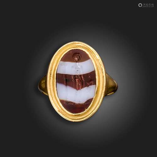 A Roman banded agate intaglio depicting an athlete, c.1st-2n...