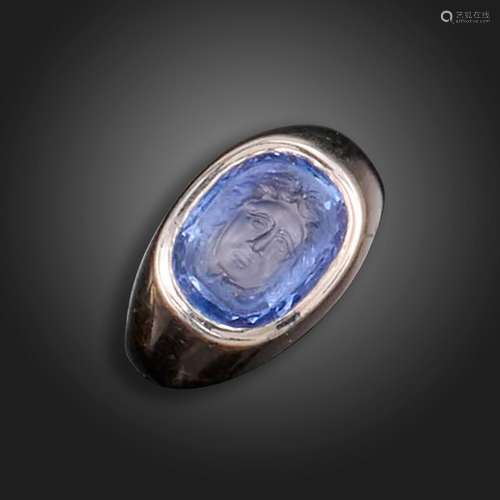 A sapphire intaglio-mounted gold ring, the oval-shaped sapph...