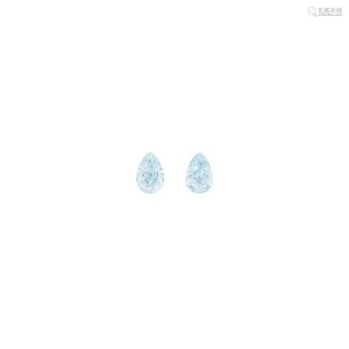 Two Unmounted Fancy Blue Diamonds