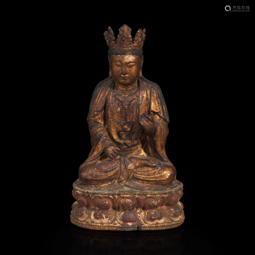 A Chinese gilt and painted lacquered wood figure of Avalokit...