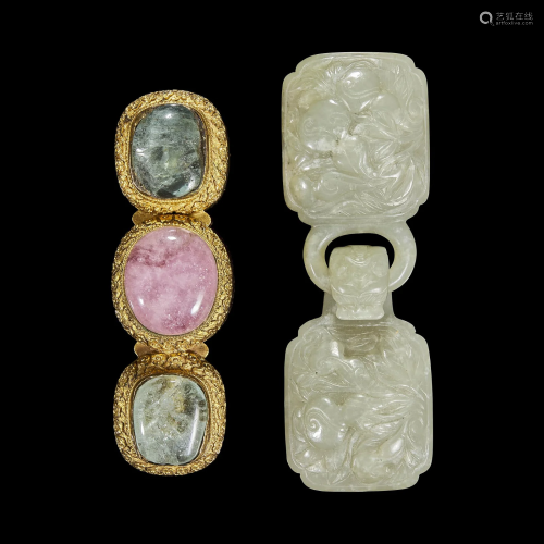 A Chinese carved jade buckle and a hardstone-mounted gilt me...