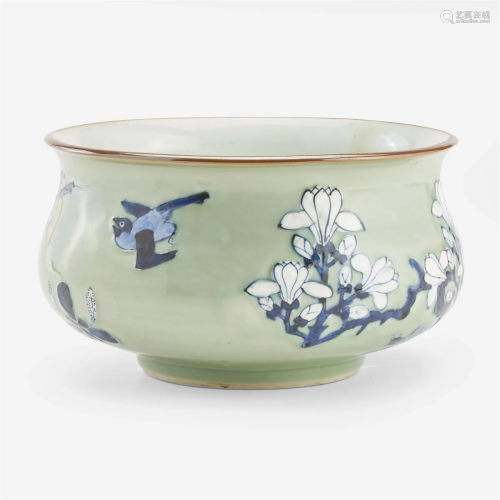 A Chinese blue and white-decorated celadon-ground porcelain ...