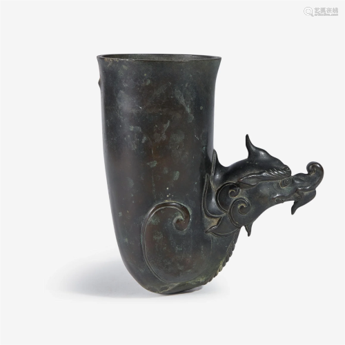A patinated bronze rhyton-form fitting or wall vase 来通杯形...
