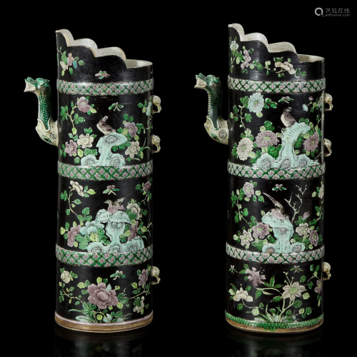 An associated pair of Chinese famille noir-decorated porcela...