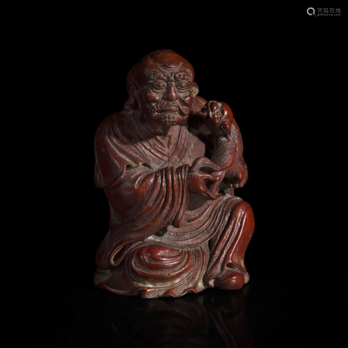 A Chinese finely-carved bamboo lohan and lion 竹雕笑狮罗汉 Q...