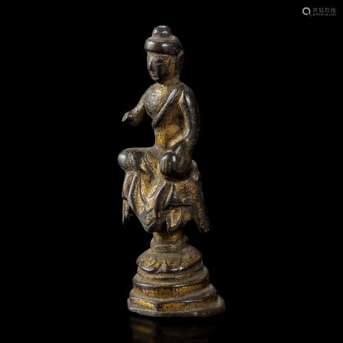 A small gilt bronze figure of a seated Buddha 铜鎏金佛造像