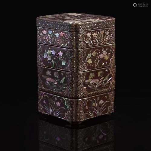 A Chinese mother of pearl-inlaid four-tier lacquer box 黑漆嵌...