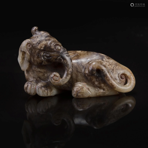 A Chinese brown and beige jade carving of a Baku 玉雕貘 Ming...