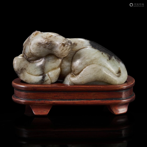 A Chinese jade carving of a recumbent horse 玉雕卧马 Ming dy...