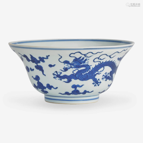 A Chinese blue and white porcelain "Dragons" ogee ...