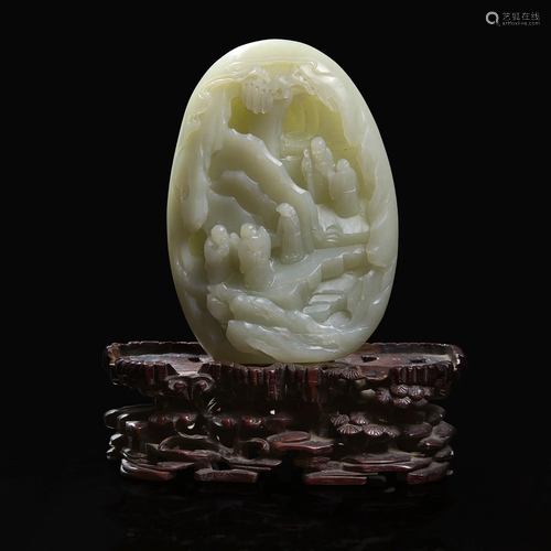 A Chinese pale celadon jade “mountain” depicting sages in la...